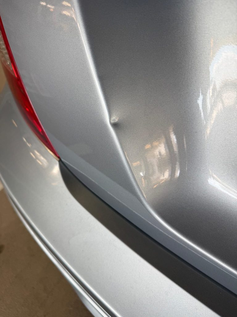 Before — dent visible